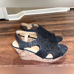 Women’s size 9.5 medium wedge platforms.